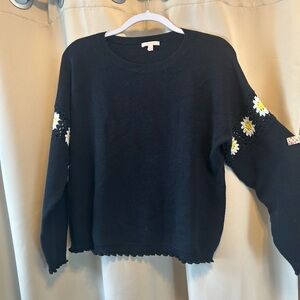 Lisa Todd Black Crewneck Sweater with White & Yellow Daisy Embroidery